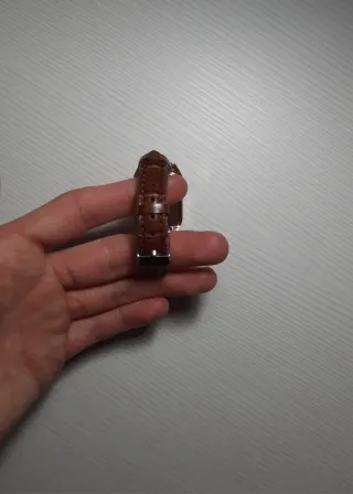 Reloj vintage marrón y dorado