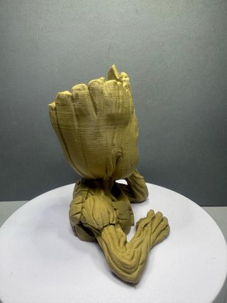 Figura Groot macetero