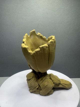 Figura Groot macetero