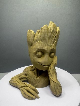 Figura Groot macetero
