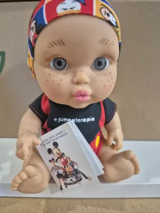 Muñeca Baby Pelón con libro Disney