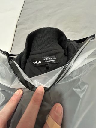 Chaqueta acolchada negra entretiempo