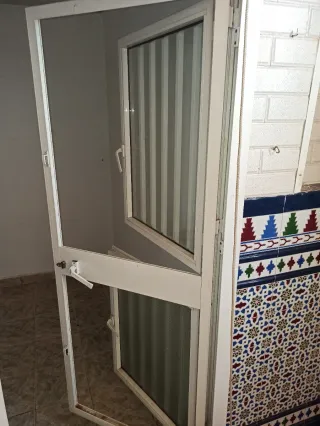 Puerta de aluminio con cristal