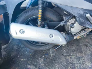 Tubo de escape Suzuki sixteen 125 2009