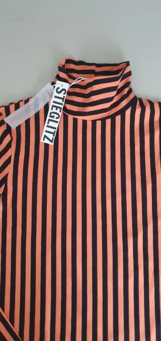 Top STIEGLITZ rayas naranja y negro