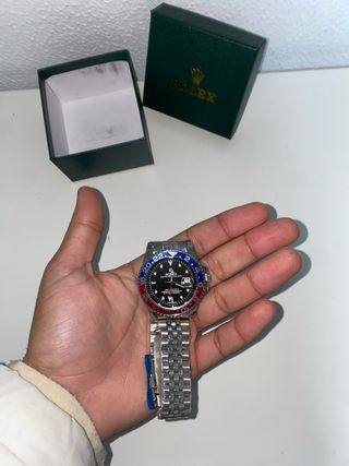 Reloj  Multicolor y Plateado