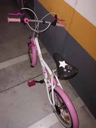 Bicicleta infantil Btwin rosa y blanca