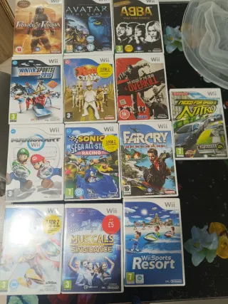 13 giochi di Wii Fit e un gioco con step sport