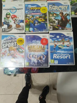 13 giochi di Wii Fit e un gioco con step sport