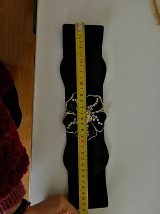 Cinturón elástico negro con flor joya