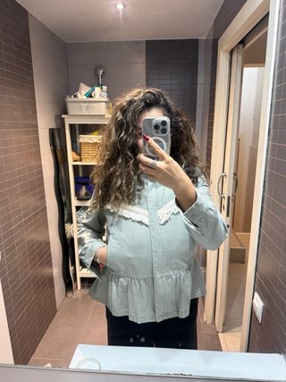 Chaqueta verde claro con flecos