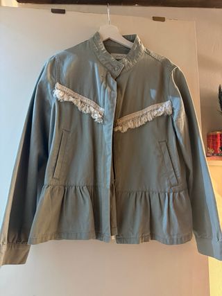 Chaqueta verde claro con flecos