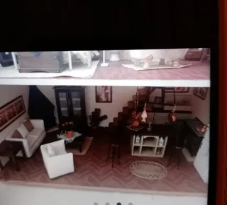 Casa de muñecas de madera