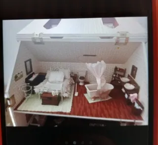 Casa de muñecas de madera