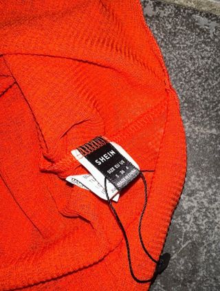 Vestido sexy naranja con aberturas