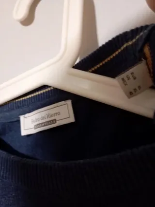 Jersey Pedro del Hierro azul logo