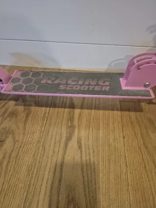 Patinete infantil rosa con diseño de unicornio