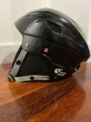 Conjunto de pantalón de esquí y casco T.14 años.