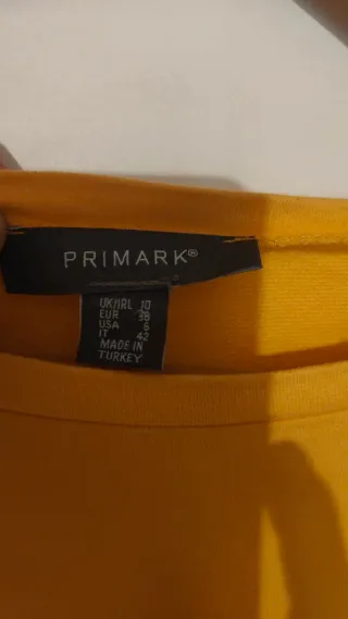 Sudadera Amarilla mostaza y volantes