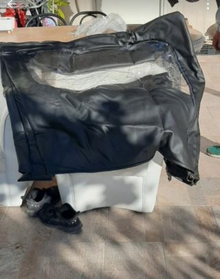 Copertura antipioggia in pelle per carrozzina