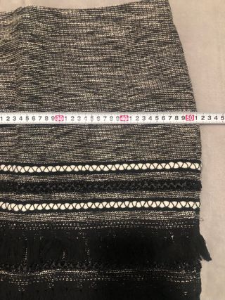 Falda mini tweed con flecos