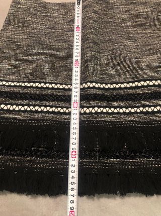 Falda mini tweed con flecos