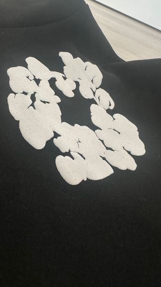 Sudadera Denim Tears Negra con Estampado Floral