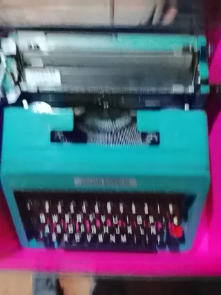 Máquina de escribir antigua color turquesa