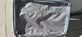 Maleta azul de viaje