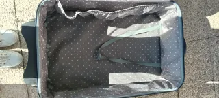 Maleta azul de viaje