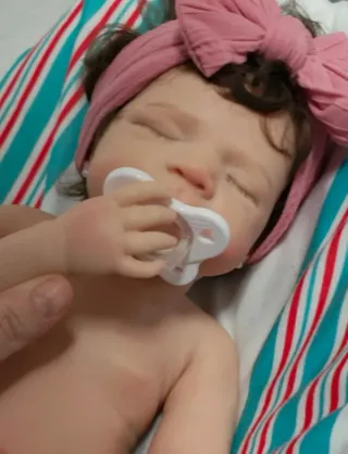 Bebé reborn de Silicona con pelo Injertado