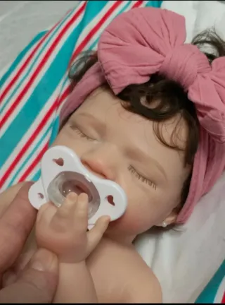 Bebé reborn de Silicona con pelo Injertado