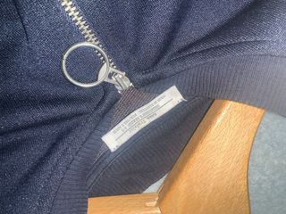 Chaqueta bomber negra, verde y blanca