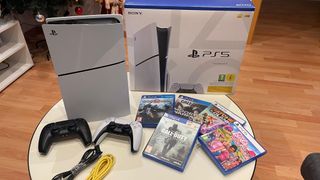 Pack PS5 + 5 Juegos + 2 Mandos