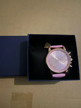 Reloj rosa y morado
