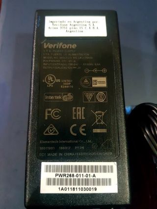 Cargador Data fono VERIFONE AU-79 0n 12V-2A