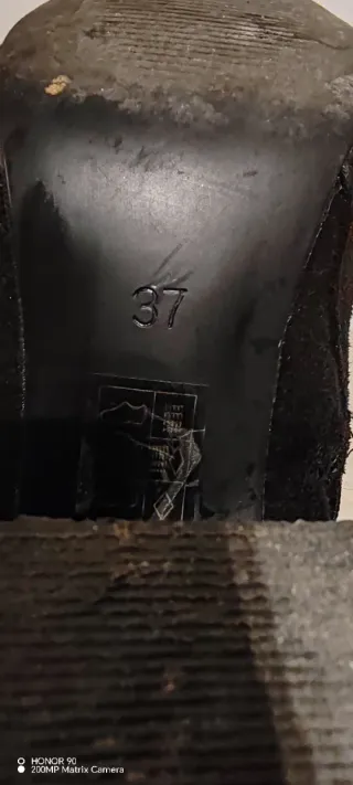 Botas altas negras con cordones