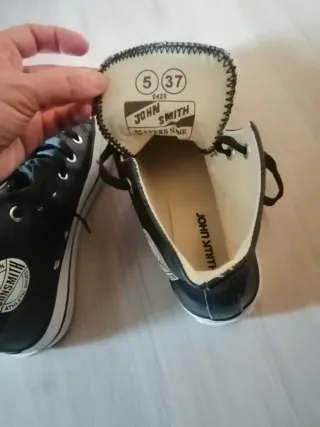 Botines tipo piel John Smith negros