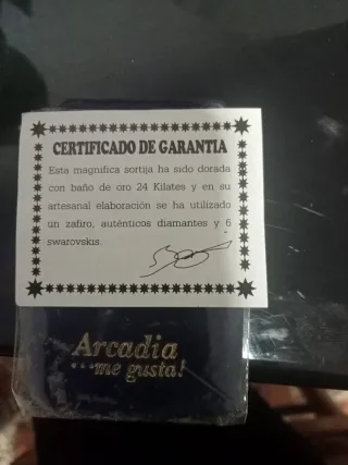 Sortija chapada en oro 24 K con circonitas