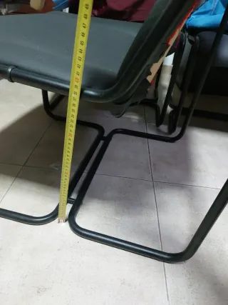 Sillones negros de piel sintética