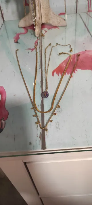 Lote 3 collane in acciaio dorato e viola