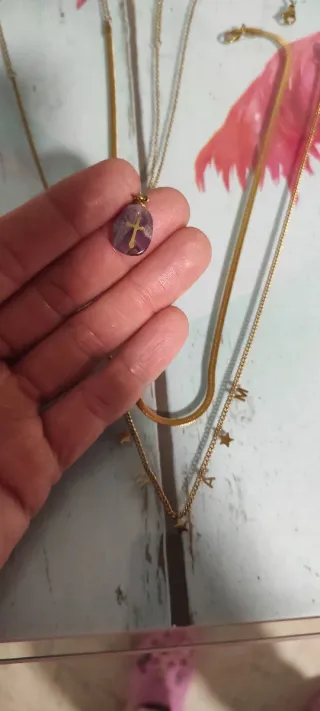 Lote 3 collane in acciaio dorato e viola