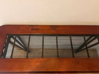 Recibidor de madera y metal