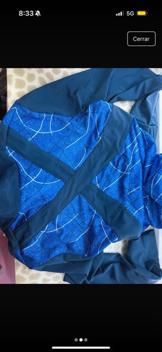 Chaquetas deportivas Decathlon negra y rosa