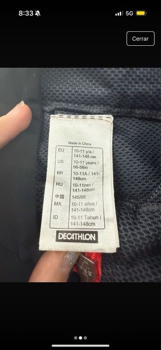 Chaquetas deportivas Decathlon negra y rosa