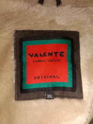 Chaqueta de piel marrón con forro beige