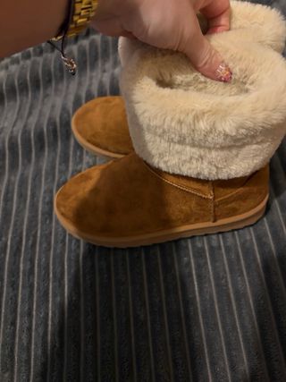 Botas de pelo marrones y beige