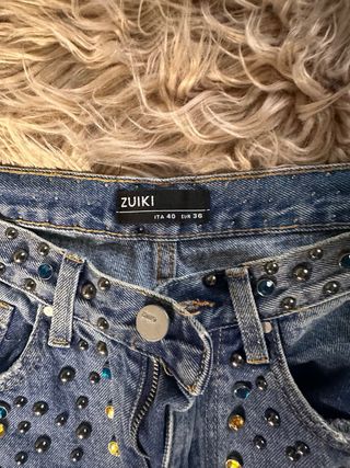 Jeans ZUIKI con strass e strappi