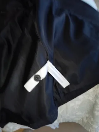 Abrigo gris con capucha