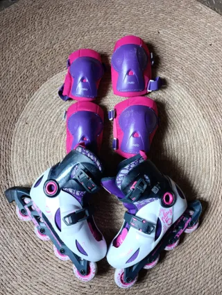 Patines Oxelo Play 5 Talla 34-36 con protecciones.
